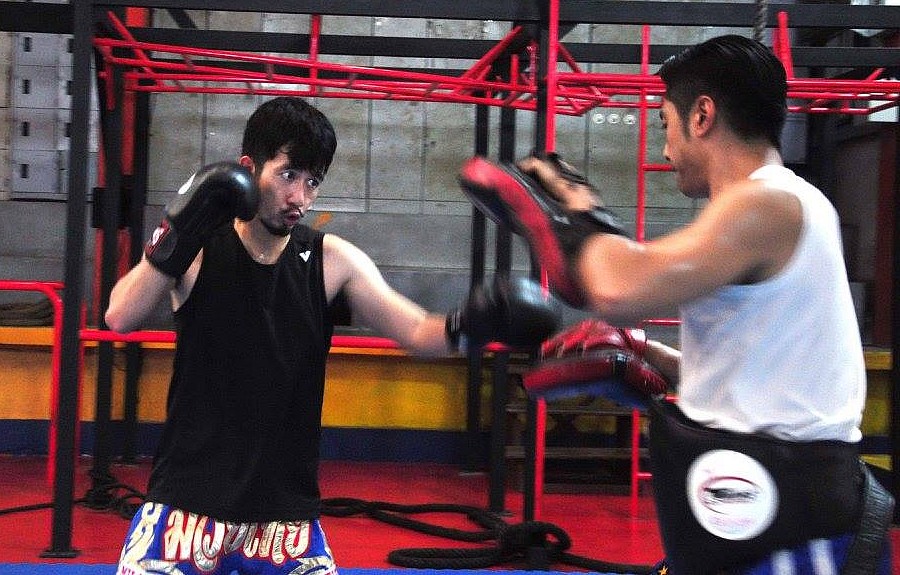 Entrainement aux paos en boxe thai